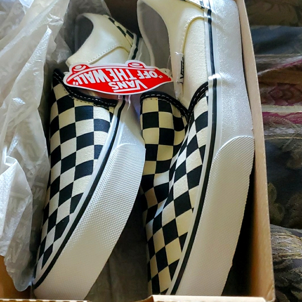 HOST PICK   Aug   Vans black white checkerboard slip on sneakers